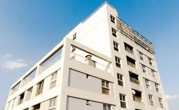 white concrete building under blue sky during daytime